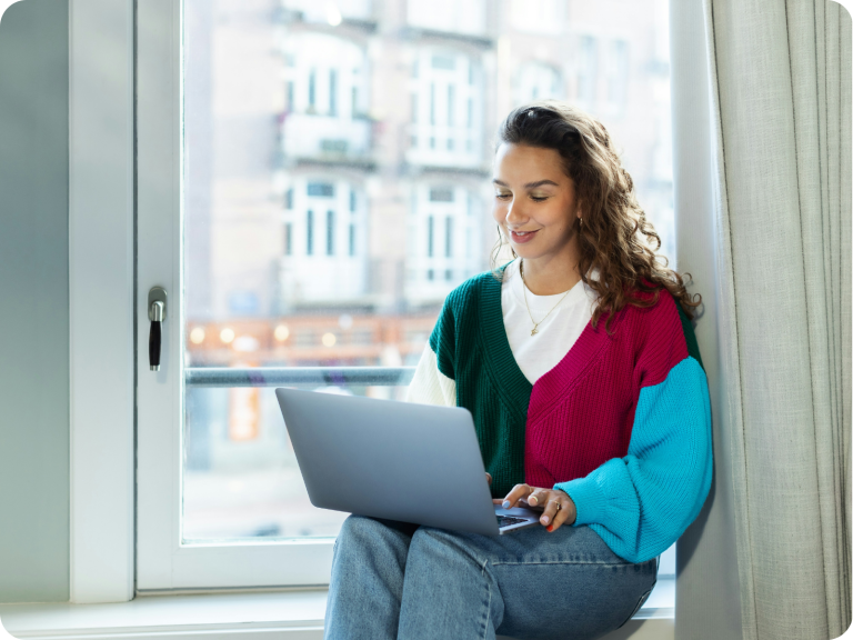 Working in IT by a window