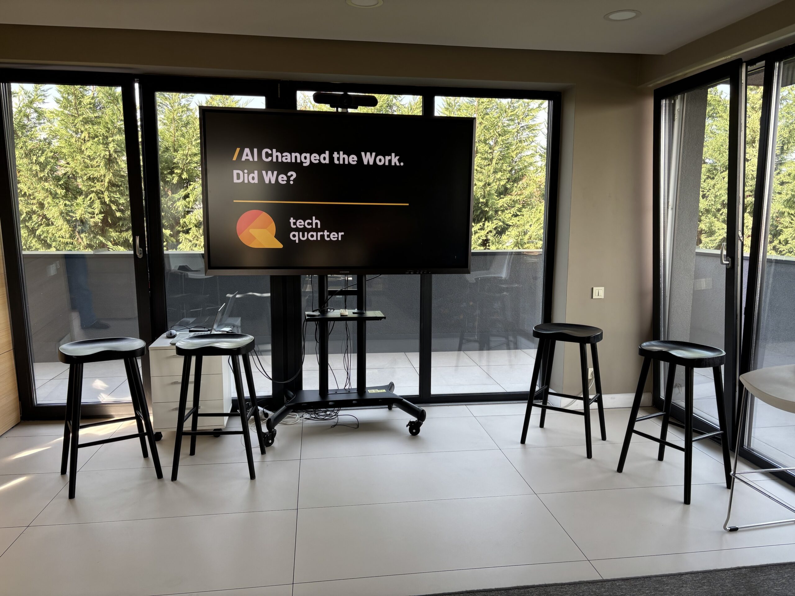 Stage set for a TechQuarter roundtable on AI for engineering teams, with the title AI Changed the Work. Did We? on screen